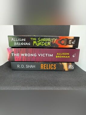 Stack of Three Paperback Mystery, suspense books